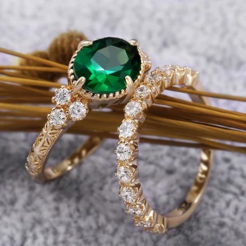 Huitan Елегантни дамски пръстен Годежен Сватба 2 бр./компл. Овална Зелен камък Златен цвят Великолепен женски пръстен на пръста Дропшиппинг